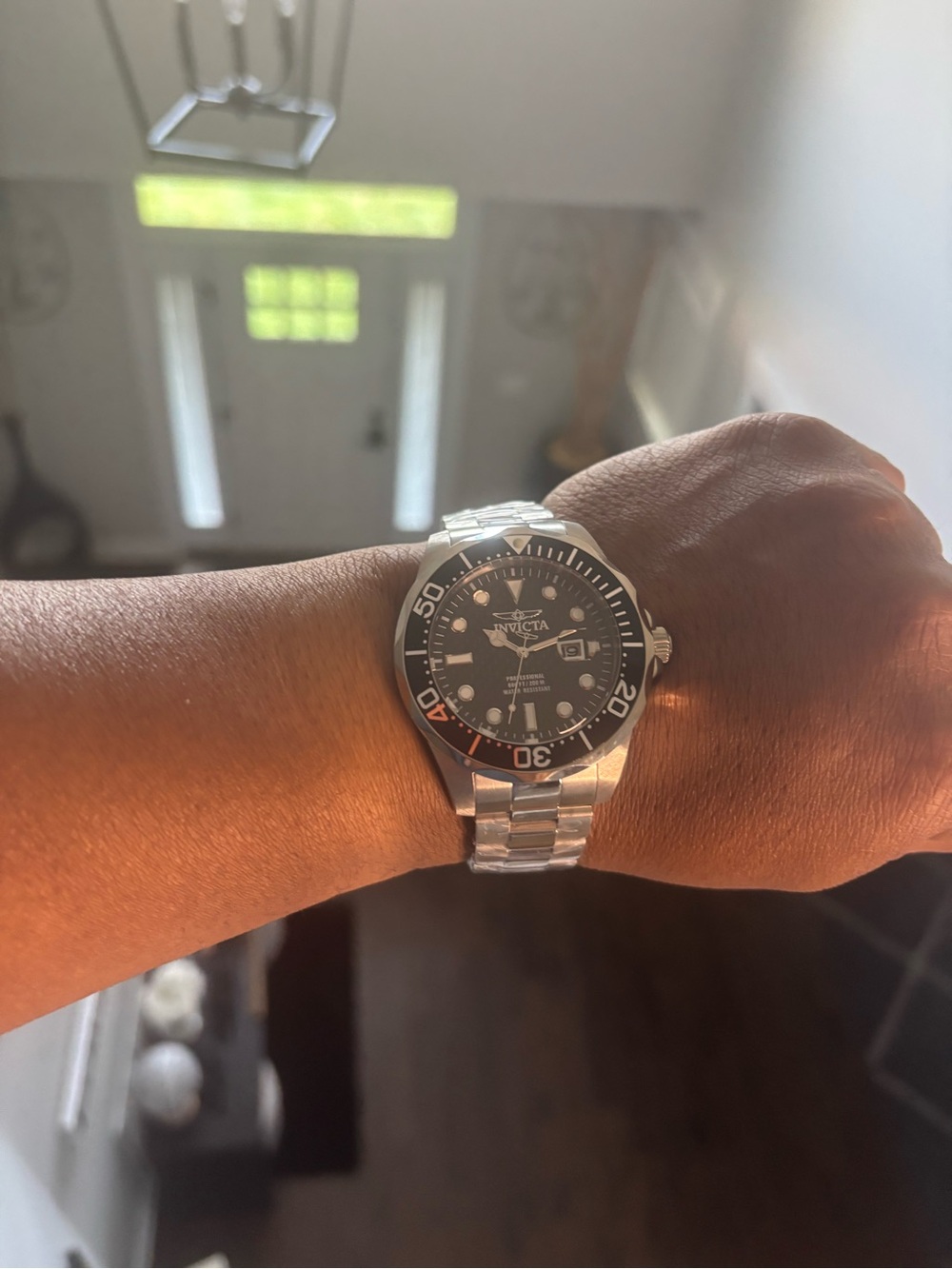 Invicta Silver Watch with Black Dial and Bezel